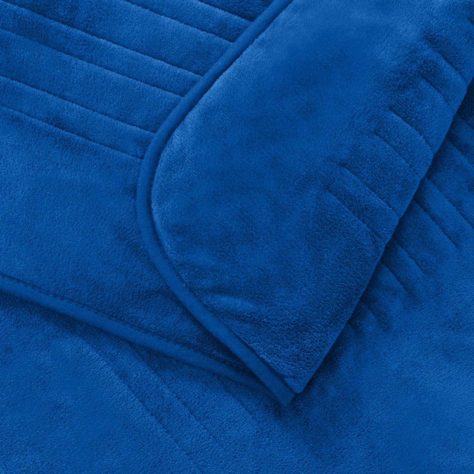 Soft coral fleece bed throw